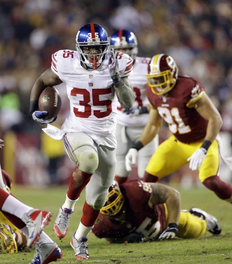 Fremad. Andre Brown på vej mod et touchdown i Giants-sejren over Washington Redskins. 