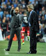 modedyr. Pep Guardiola i moderne jakkesæt, mens Jürgen Klopp (nedenfor) er i vild gul dunjakke. 