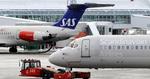 arbejdsløs. Her slæber en specialbygget traktor af sted med et SAS-fly. Den arbejdsopgave kan bliver overtaget af en elmotor i flyets næsehjul. 