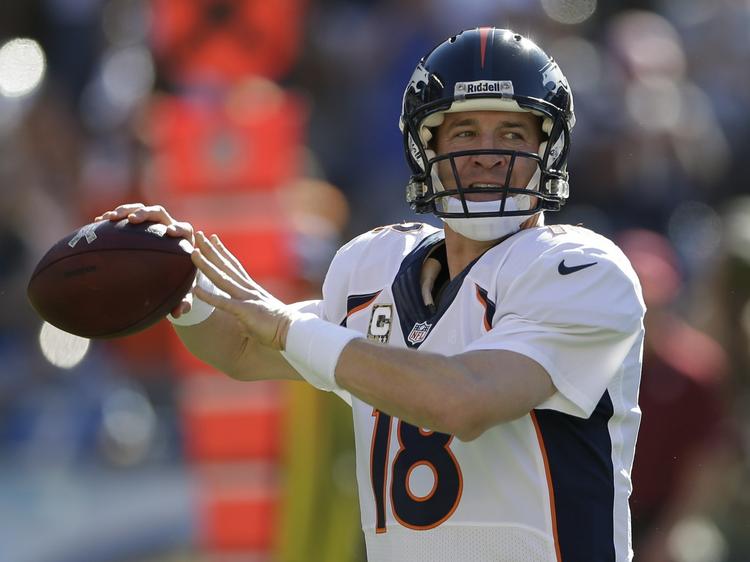 Kastearm. Peyton Manning er i gang med en rekordsættende sæson. Han er netop blevet kåret til 'årets sportsmand' af Sports Illustrated. 