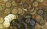 cyperpenge. Bitcoins er en virtuel valuta, men sådan kunne den se ud, hvis den var en fysisk mønt. 
