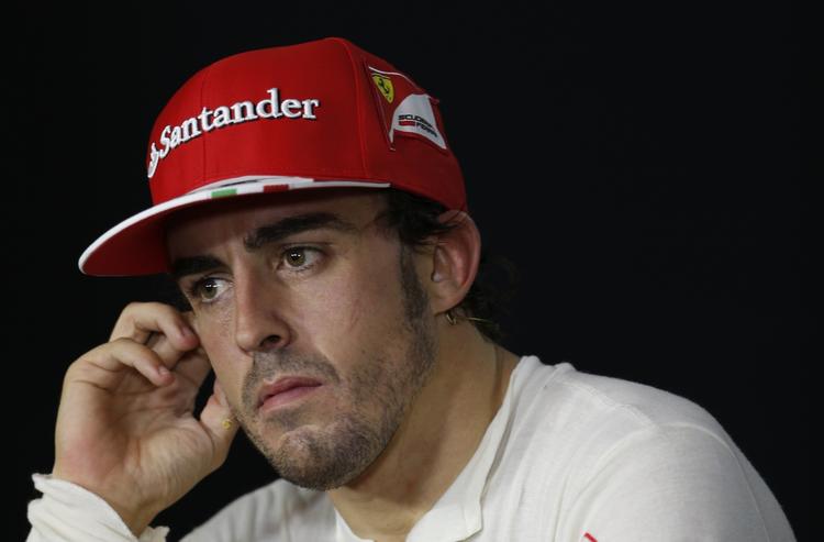 Cykelboss?. Fernando Alonso har ikke lagt drømmen om at få et cykelhold på hylden. 