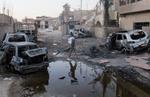 sikkerheden er så elendig, at vi slet ikke kan rejse i de lande, vi ellers mente at have befriet fra undertrykkelse. Og terrortruslen mod os selv er stadig betydelig. (gadebillede fra Irak) 