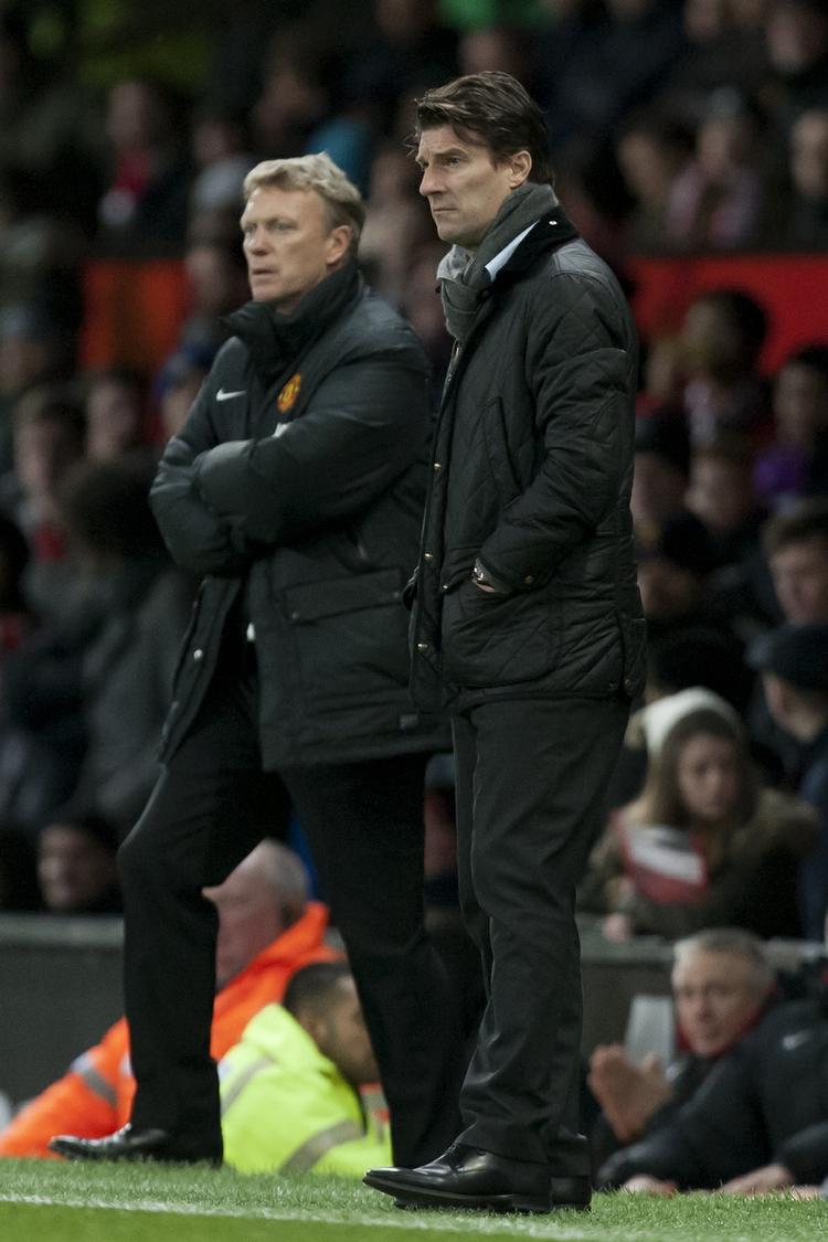 Pokaldyst. En scoring i 90. minut af Wilfred Bony gav Laudrup (th) en sejr over Manchester United og den nu endnu mere pressede David Moyes (tv). 