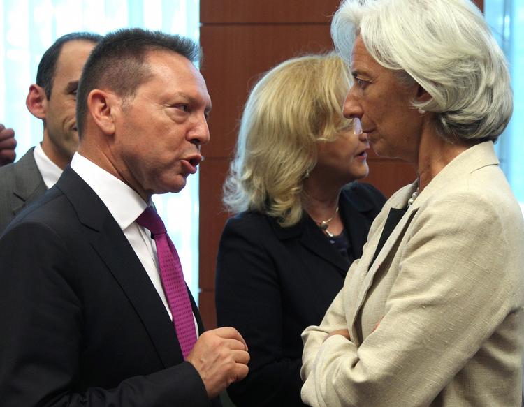 krav. Yannis Stournaras i samtale med chefen for Den Internationale Valutafond, IMF, Christine Lagarde, som har stillet barske krav til den græske finansminister. 
