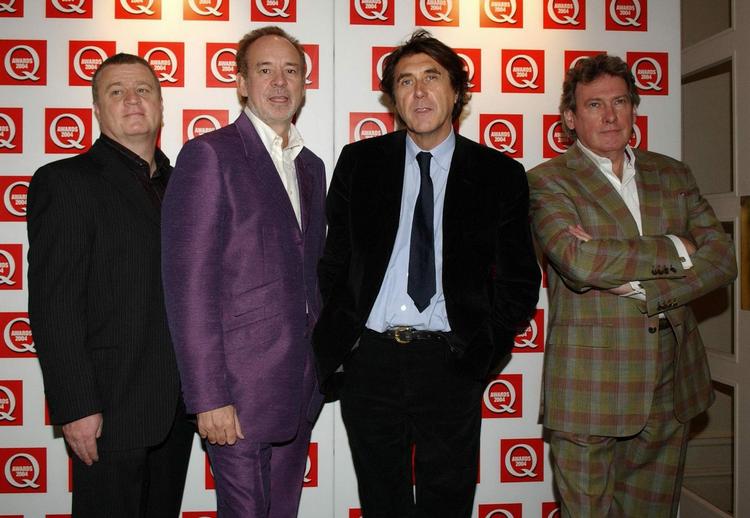 Forbillede. Designeren Marc Jacobs talte i Milano om sangeren Bryan Ferry (nummer to fra højre), som et forbillede, der stadig evner at klæde sig skarpt og personligt. 