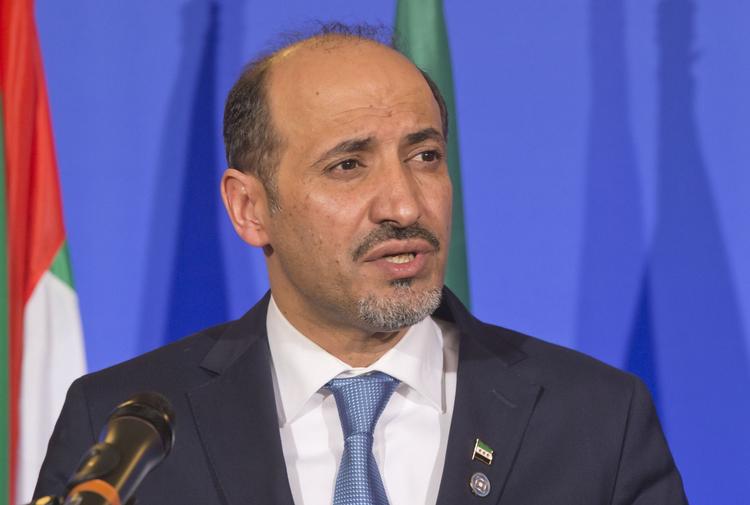Oprørere. Ahmad al-Jarba står i spidsen for Syriens Nationale Koalition, som truer med at blive væk fra fredskonference, hvsi Iran kommer. 