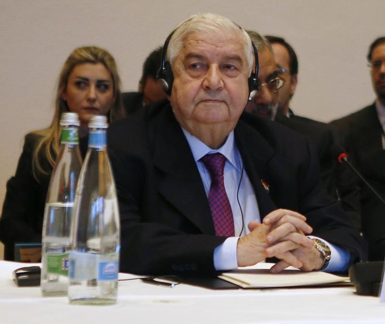 Ophidset. Syriens udenrigsminister Walid al-Moallem endte i en ophidset meningsudveksling med FN's generalsekretær Ban Ki-moon ved fredskonferencen Geneve II. 