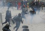 Kamp. To er døde som følge af sammenstød mellem politi og aktivister i Kijev. En tredje styrtede selv i døden fra toppen af et stadion. 