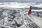 Koldt. Et Southwest-fly nærmer sig landing i Lambert–St. Louis International Airport i St. Louis. 