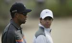 Topduel. Woods og McIlroy (i baggrunden) fulgtes på 1. runde med skotten Stephen Gallagher, der brugte 66 slag. 