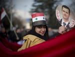 Demonstration. Pro-Assad demonstrant på gaden under forhandlinger om en fremtid uden krig i Syrien. 