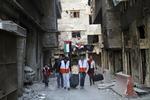 Fremtid. Røde Kors hjælper flygtninge ud fra den belejrede palæstinensiske flygtningelejr Yarmouk. 