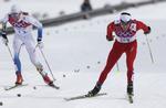 Afgørelsen. Fire tiendedele sekund skilte Dario Cologna (th.) og Marcus Hellner i guldstriden. 