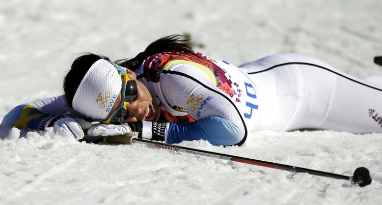 Sølv. Charlotte Kalla var forsvarende mester på 10 km, der for fir eår siden blev afviklet i fri teknik. 