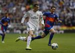 3-0. Real Madrids Gareth Bale (tv) betalte lidt tilbage til klubben - som købte ham for en rekordsum i Tottenham - i kampen mod Elche. 