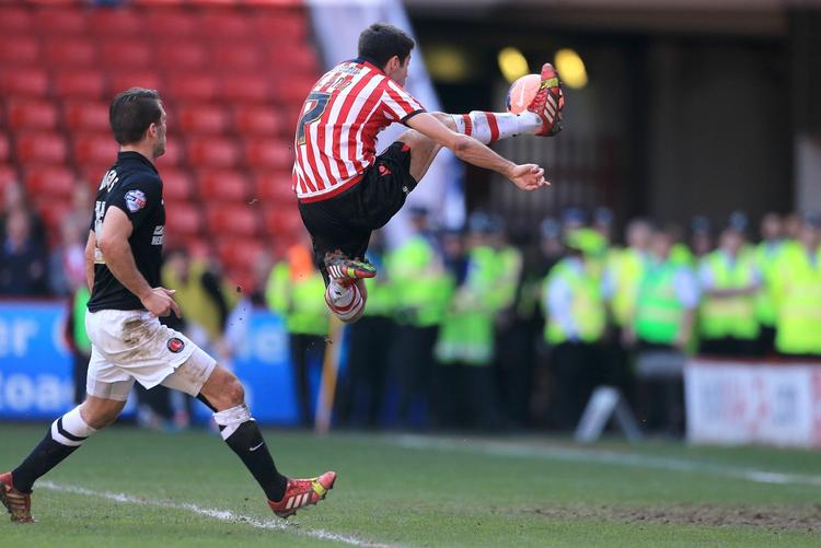 SEMIFINALIST. På mål af Ryan Flynn (billedet) og John Brayford nåede Sheffield United frem til FA Cup-semifinalen for første gang siden 2003. 