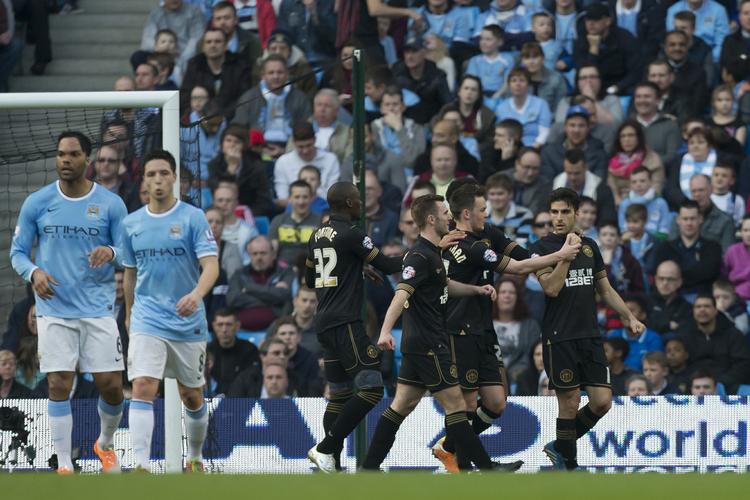 0-1. Et straffespark satte Wigan på sejrskurs mod Manchester City. 