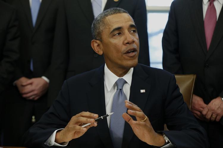 Overvågning. Præsident Obama tror på CIA-direktørs forklaring om hackeranklager. 