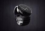 BÆRBAR. Det er muligt at Moto 360 her ligner et helt almindeligt ur. Men urfladen er faktisk et digitalt billede på en skærm, der drives af Googles nye skrabede smarturs-version af Android med tilnavnet Wear. (Foto PR-foto/Motorola) 