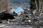Ødelæggelse. Mudderskreddet har ødelagt mange huse. 