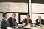 ejerskifte. De nye ejere af Nets trådte i går frem for offentligheden. Fra venstre ses Robin Marshall, managing director i Bain Capital, James Brocklebank, managing partner i Advent International, Carsten Stendevad, direktøren i ATP og Peter Lybecker bestyrelsesformand i Nets. 