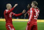 Timing. Arjen Robben (tv) blev tysk mester i sin ligakamp nummer 100 for FC Bayern München. 
