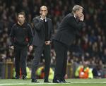 Kampdag. Forberedelserne til returkampen sættes formentlig allerede i gang, når Moyes (th) og Guardiola senere i dag trækker i træningsdragten igen. 