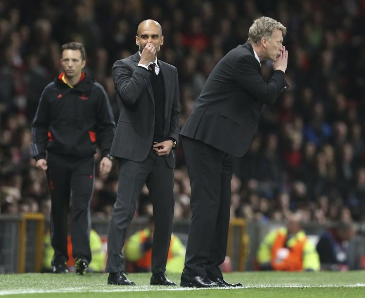Kampdag. Forberedelserne til returkampen sættes formentlig allerede i gang, når Moyes (th) og Guardiola senere i dag trækker i træningsdragten igen. 