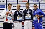 AFSLØRET. Hvis Vitaly Melnikov (tv.) fratages sin sølvmedalje i 100 meter rygcrawl fra EM i Herning, rykker  Camille Lacourt og Christoph Walker-Hebborn op som delte sølvvindere efter Jeremy Stravius. 