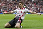 Farvel. Den 34-årige Liverpool-spiller meddeler, at han indstiller sin landsholdskarriere efter 14 år. 