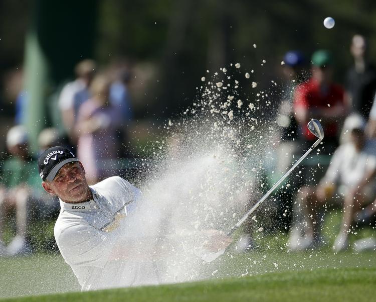 Udflugt. Thomas Bjørn på vej ud af bunkeren ved 17. hul på Augusta-banen. 
