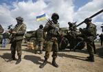ANTI-TERROR. Sådan kalder den ukrainske overgangsregering dagens aktioner i det østlige Ukraine. Her ses kampvogne på en mark i det østlige Ukraine inden aktionen mod lufthavnen i Kramatorsk. 