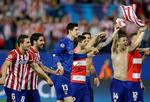 Succes. Atlético Madrid-spillerne har distanceret Real Madrid og FC Barcelona i den hjemlige liga og er fortsat med i Champions League. 
