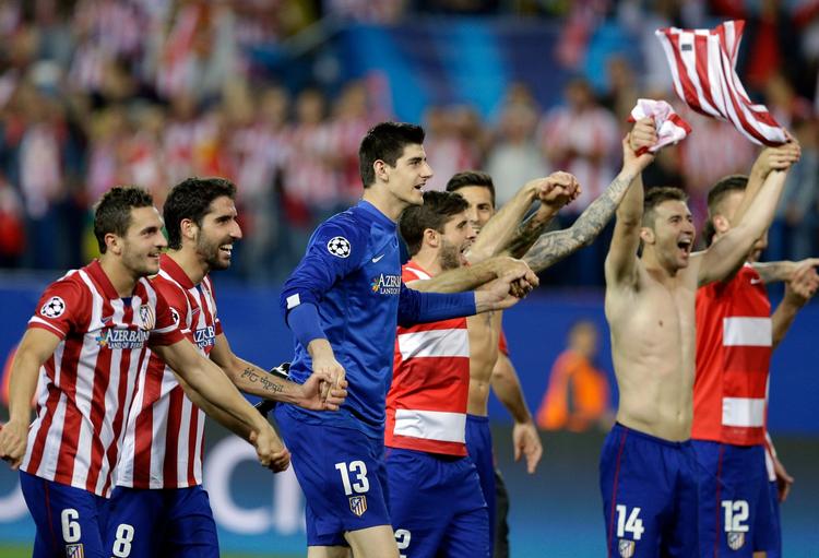 Succes. Atlético Madrid-spillerne har distanceret Real Madrid og FC Barcelona i den hjemlige liga og er fortsat med i Champions League. 