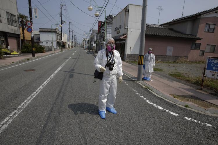 Strålefare. For bare tre år siden var der masser af liv i den lille by Tomioka, der ligger i nærheden af det tidligere Fukushima-atomkraftværk. 