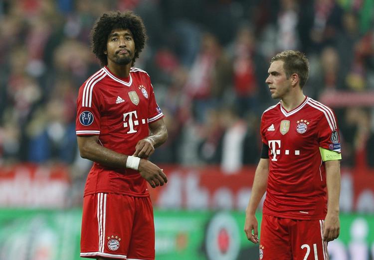 Nedtur. Forsvarschefen Dante (tv) og anfører Lahm spillede langt under vanligt niveau mod Real Madrid. 