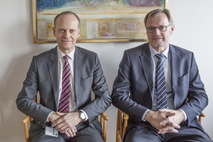 AFBRUDT. Nykredit, der ejer Totalkredit, vil ikke længere samarbejde med Jyske Bank. Årsagen er, at Jyske Bank med direktør Anders Dam, th, i spidsen, har købt Totalkredits konkurrent BRF, hvor Sven Blomberg, tv, er direktør. 