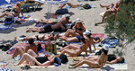 Tøjskift. Tager du strandmunderingen med op i La Palma på Mallorcas gader, risikerer du til sommer at få en bøde. 
