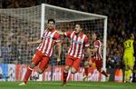 pletskud. Diego Costa og Koke fejrer førstnævntes scoring til 1-2 på straffespark. - Foto: Kirsty Wigglesworth/AP 