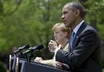 Pressemøde. Den tyske kansler, Angela Merkel, og den amerikanske præsident, Barack Obama, i Washington. 