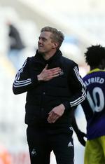 klubmand. Garry Monk var anfører for Swansea, da Michael Laudrup tog over som træner i klubben. 