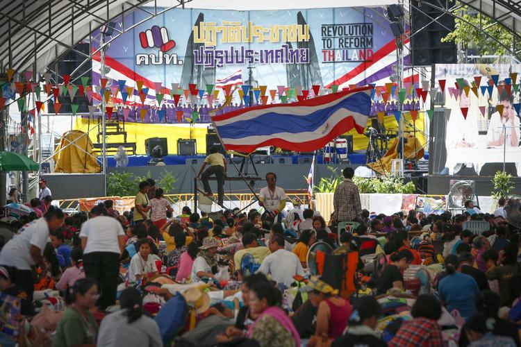 protest. De såkaldte rødskjorter er utilfredse med, at en ikke-folk 