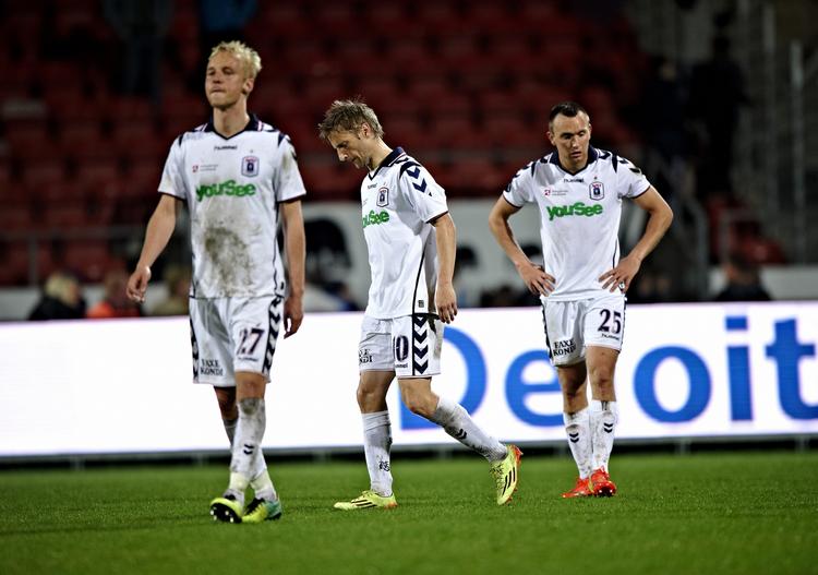 Nedtur. Anders Kure (tv) er nu rykket ned tre gange med AGF. Martin Jørgensen (midten) og KasperPovlsen har kun prøvet det to gange. 