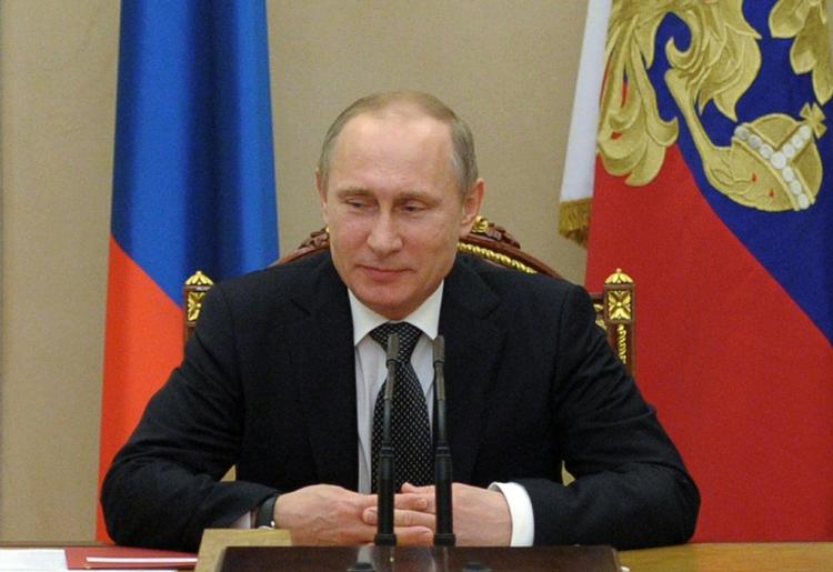 Ukraine. Ruslands præsident Vladimir Putin ved et møde i sit sikkerhedsråd. 