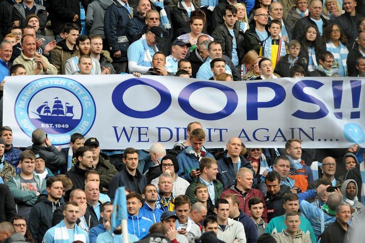 Ups. City-fansene havde fundet sarkasmen frem, da de vandt mesterskabet, men den økonomiske side ser ikke køn ud. 