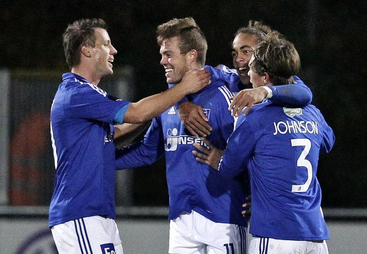 karantæne-point. Ryan Johnson Laursen (th med nummer 3) ses her juble over en scoring, da spilleren optrådte for Lyngby. 