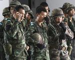 Militærkup. Soldater i Bangkok stod tidligere i dag og ventede på ordre. Et kup er nu en realitet. 
