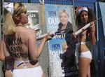 Demonstration. Højrenationalistiske Front National er et kontroversielt parti under ledelse af Marine Le Pen. Her demonstrerer modstandere af partiet med en vaccine mod facister. Foto: AP 