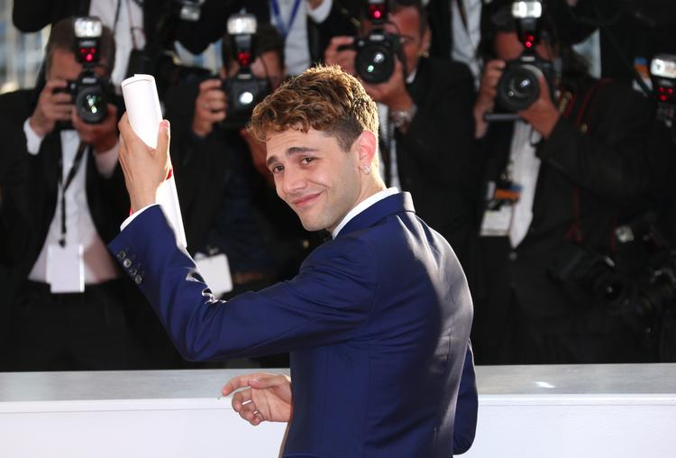 Stjerneglad. Canadiske Xavier Dolan, 'Mommy', var lykkelig for en delt særpris sammen med Jean-Luc Godard. Var han skuffet over ikke at få palmen, viste han det i hvert fald ikke. 